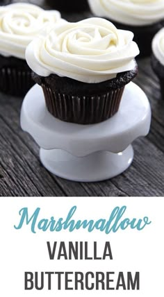 vanilla buttercream cupcakes with white frosting on top and the title overlay reads marshmallow vanilla buttercream