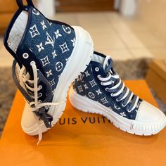 Denim High Top Lv Sneakers 2 Pair Of Laces White/Denim Only Worn Once Come Wit Dust Bag N Box Shoes Louis Vuitton, Lv Sneakers, Louis Vuitton Sneakers, Louis Vuitton Boots, Louis Vuitton Shoes, Sneaker Shopping, White Denim, Womens Shoes Sneakers, High Top