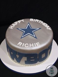 a birthday cake with a star on the top