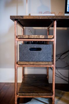 a wooden shelf with two baskets on it