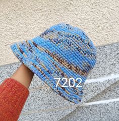 Crochet Bucket Hat Man / Women. Unisex bucket hat made of cotton mix. These hats are so colorful that they can never be done the same 🤗 So... you will have a unique piece! They are suitable for spring and autumn weather. The yarn is soft. You can wash it in the washing machine with cold water. Size S/M fits well small heads (54-56cm / 21"-22") Size M/L fits well standard heads (57-59cm / 23") Size XL fits well with a larger noggin (60-62cm / 24") Yarn: Mix of cotton and acrylic Don't hesitate t Hand-knitted Cotton Brimmed Hat, Hand Knitted Cotton Brimmed Hat, Blue Hand-knitted Bucket Hat, Blue Hand Knitted Bucket Hat, Blue Yarn Hat With Short Brim, Blue Yarn Brimmed Bucket Hat, Hand Knitted Brimmed Cotton Bucket Hat, Handmade Blue Bucket Hat One Size, Blue Handmade Outdoor Hat