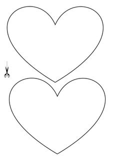 two hearts cut out with scissors to make them look like they are in the shape of heart