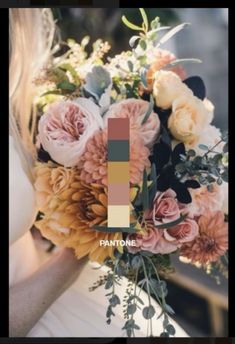 a woman holding a bouquet of flowers in her hands with the color pantone on it