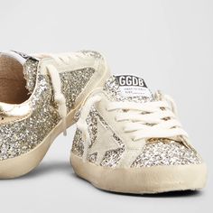 Rare Golden Goose Superstar Glitter Metallic Silver Gold Sneakers Size 40. Color Is Platinum/Crme Brle. Fit Like A 9-10. No Cracks In The Glitter. Originally Purchased From Neiman Marcus. Come From A Smoke And Pet Free Home. Couldn’t Find Og Picture Online So The First Picture Of This Listing Is Of The Kids Version Of This Shoe. Golden Goose Superstar, Denim And Diamonds, Gold Sneakers, Sophisticated Outfits, Glitter Sneakers, Golden Goose Shoes, Baby Sneakers, Star Sneakers, Dove Cameron