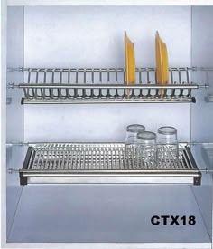 stainless steel kitchen shelf with utensils and cups