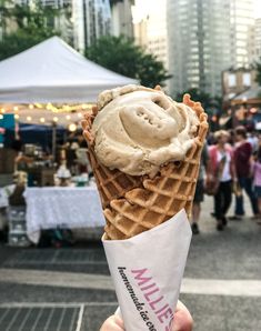 an ice cream sundae is in a waffle cone