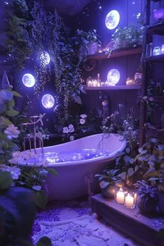 a bathtub in a room with plants and candles on the floor, surrounded by potted plants