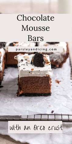 chocolate mousse bars with an oreo crust and white frosting on top