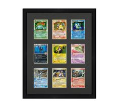 the pokemon trading card collection is displayed in a black frame