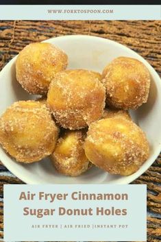 air fryer cinnamon sugar donut holes in a white bowl