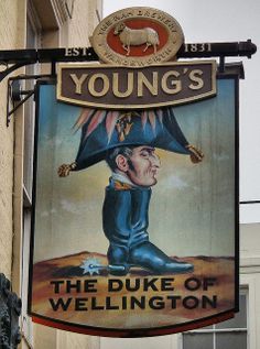 a sign on the side of a building that says young's, the duke of wellington