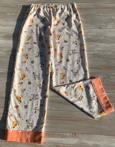 "Lounge Pants/Pajamas for Men and Women who love their pets! Handmade item, made to order Comfy non roll elastic waist All seams finished 100% cotton flannel Coordinating fabric trim bottom and decorative button Machine washable Made in a smoke free environment Made in the USA *Fabric is not prewashed and will shrink approximately 1\" in length" Adult Pajamas, Cute Notes, Print Pajamas, Mens Pajamas, Coordinating Fabrics, Lounge Pants, Fabric Trim, Cotton Flannel, Cow Print