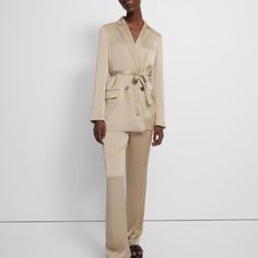 Super Chic Women's Matching Suit Set From Theory, Crafted From A Japanese Crafted Lightweight Satin With A Subtle Crinkled Texture. Jacket Is Size Small, Single-Breasted Silhouette With An Elasticized Belt For A Tempered Fit. Accented With Notch Lapels And Flap Pockets. Pants Are Size 2, And Pull-On Style, Designed With Pressed Straight Legs, A Partial Elastic Waistband, And Side Slip Pockets For An Effortless Approach To Tailoring. Originally Purchased From Theory For $820. Nwt And Never Worn. Chic Silk Suits For Office, Chic Silk Suit With Notch Lapel, Chic Silk Suits With Notch Lapel, Chic Silk Notch Lapel Suits, Chic Tailored Silk Suits, Elegant Silk Pantsuit For Workwear, Tailored Silk Pantsuit For Workwear, Spring Silk Pantsuit For Workwear, Spring Silk Formal Pantsuit