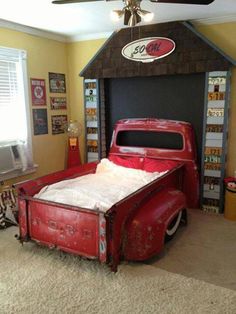 an old red truck bed in a child's room