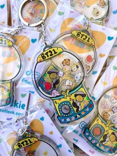 several key chains with cartoon characters on them