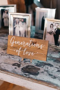 wooden sign that says generations of love with photos in the back ground and on top of it