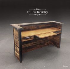 a desk made out of wood and metal with the words fallen industry written on it