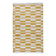 a yellow and white rug with squares on it, in front of a white background