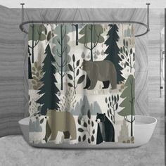 a shower curtain with bear and trees on it