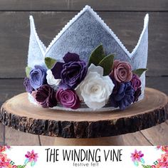 a close up of a cake on a wooden table with the words the winding vine above it