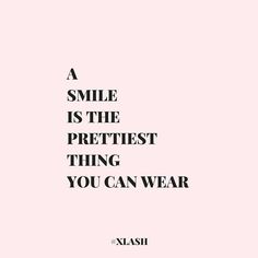 a quote that says, a smile is the prettiest thing you can wear