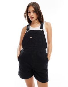 Jumpsuits & Rompers by Dickies Co-ordinating made easy Classic overalls design Adjustable buckle straps Buttoned sides Functional pockets Logo patch detail Regular fit Black Utility Overalls With Side Pockets, Black Cotton Shortalls With Pockets, Black Overalls With Bib Front And Pockets, Black Cotton Overalls With Suspenders, Utility Shortalls With Suspenders, Utility Style Shortalls With Suspenders, Black Bib Front Utility Overalls, Black Utility Overalls With Bib Front, Utility Shortalls With Adjustable Bib Front