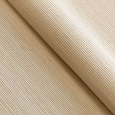 a close up shot of a beige fabric