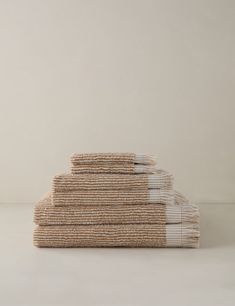 stack of folded towels on white background