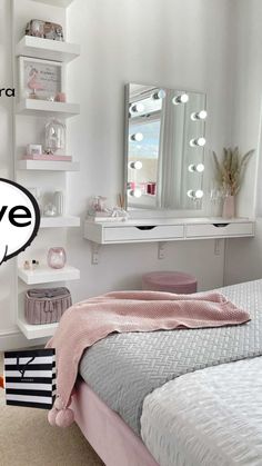 a bedroom with a bed, mirror and shelves on the wall in front of it