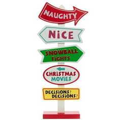 Dimensions: 24.56" H x 10.25" W x 2.56" D Material: MDF Color: Red, White, Green & Yellow Quantity: 1 Are you on the naughty or nice list this year? Naughty & Nice Wood Sign has a tall street sign shape with unique arrows pointing in either direction. Each arrow has a comical phrase on it to encourage the holiday spirit! Set this decoration in your entryway or living room for a funny seasonal addition to the space.   Full Text:  Naughty Nice Snowball Fights Christmas Movies Decisions? Decisions? Christmas Tree Drawing, Wood Arrow, Grinch Christmas Decorations, Christmas Craft Fair, Christmas Card Art, Christmas Signs Wood, Holiday Crafts Christmas, Wood Creations, Christmas Door Decorations