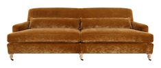 a brown couch sitting on top of a white floor