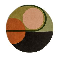 a circular rug with an abstract design on it