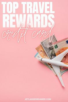 a pair of scissors sitting on top of a pile of money with the words top travel reward