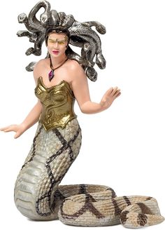 a statue of a woman dressed as a snake