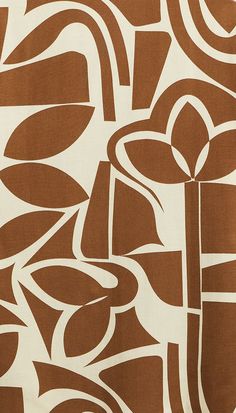 a brown and white abstract design on fabric