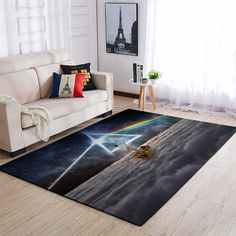 a living room area rug with a rainbow in the sky