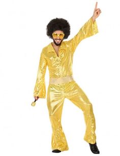 a man in a gold disco suit with sunglasses on his head and one hand up