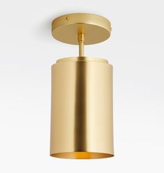 an overhead view of a gold colored light fixture