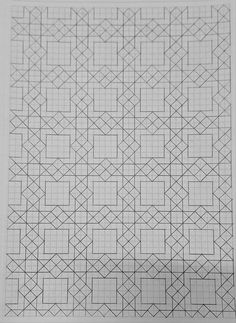 an intricate pattern is shown in the middle of a sheet of paper with lines drawn on it