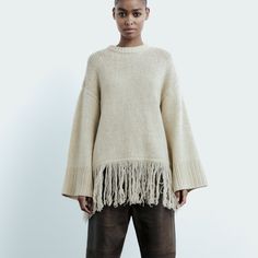 Fringed 100% Wool Sweater Sweater Made Of 100% Wool . Round Neck And Long Sleeves . Fringed Hem And Rib Trim . Ecru Width: 24.5in Flat New With Fuzzy Skirt, Dark Green Sweater, Long Black Cardigan, Oversized Knit Cardigan, Fringe Sweater, High Neck Sweater, Pink Crewneck, Detailed Sweater, Zara Sweater