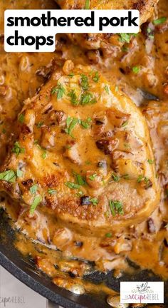 some chicken chops are in a skillet with sauce and parsley on top