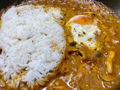 an egg and rice dish in a skillet