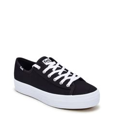 Keep it cute and simple with these women’s Triple Kick black/white platform sneakers. Designed with cotton canvas upper, these casual kicks have a round toe, lace-up closure, soft and breathable canvas lining, and a rubber platform sole. The Softerra™ memory foam footbed made with 10% recycled PU foam treats your feet to sustainable comfort. | Keds Women's Triple Kick Platform Sneaker in Black/White Size 5. 5 Medium Keds Shoes Platform, Keds Triple Up, White Platform Sneakers, White Platform, Keds Shoes, Platform Sneaker, Platform Sneakers, Sneaker Shopping, Keds