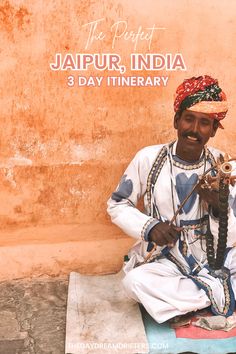 a man sitting on the ground playing an instrument with words above him that read, the perfect japurr, india 3 day itinerary