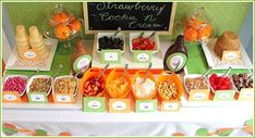 a table topped with lots of different types of foods and desserts on top of it