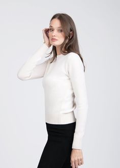 Pure cashmere yarn is crafted in an accentuating silhouette and enhanced with rib-knit edges, resulting in a sophisticated piece destined to become a wardrobe staple. 7 gauge Regular fit Handcrafted in Italy Cashmere Crew Neck Knit Top For Layering, Classic Crew Neck Cashmere Knit Top, Classic Cashmere Knit Top With Crew Neck, Classic Cashmere Crew Neck Knit Top, Cream Cashmere Sweater With Ribbed Cuffs, Elegant Sweater With Ribbed Crew Neck, Cashmere Crew Neck Knit Top, Chic Merino Wool Crew Neck Sweater, Chic Crew Neck Sweater With Ribbed Cuffs