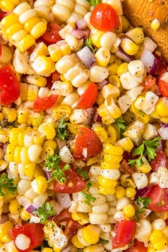 corn salad with tomatoes, onions, and parsley