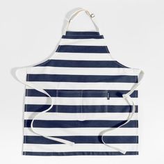 a blue and white striped apron with straps