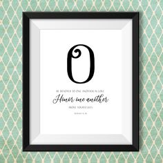 a black and white framed print with the number nine on it's front corner