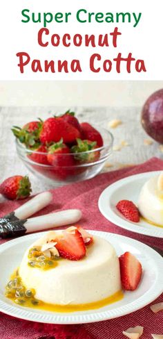 two white plates topped with cheesecake and strawberries next to a bowl of fruit